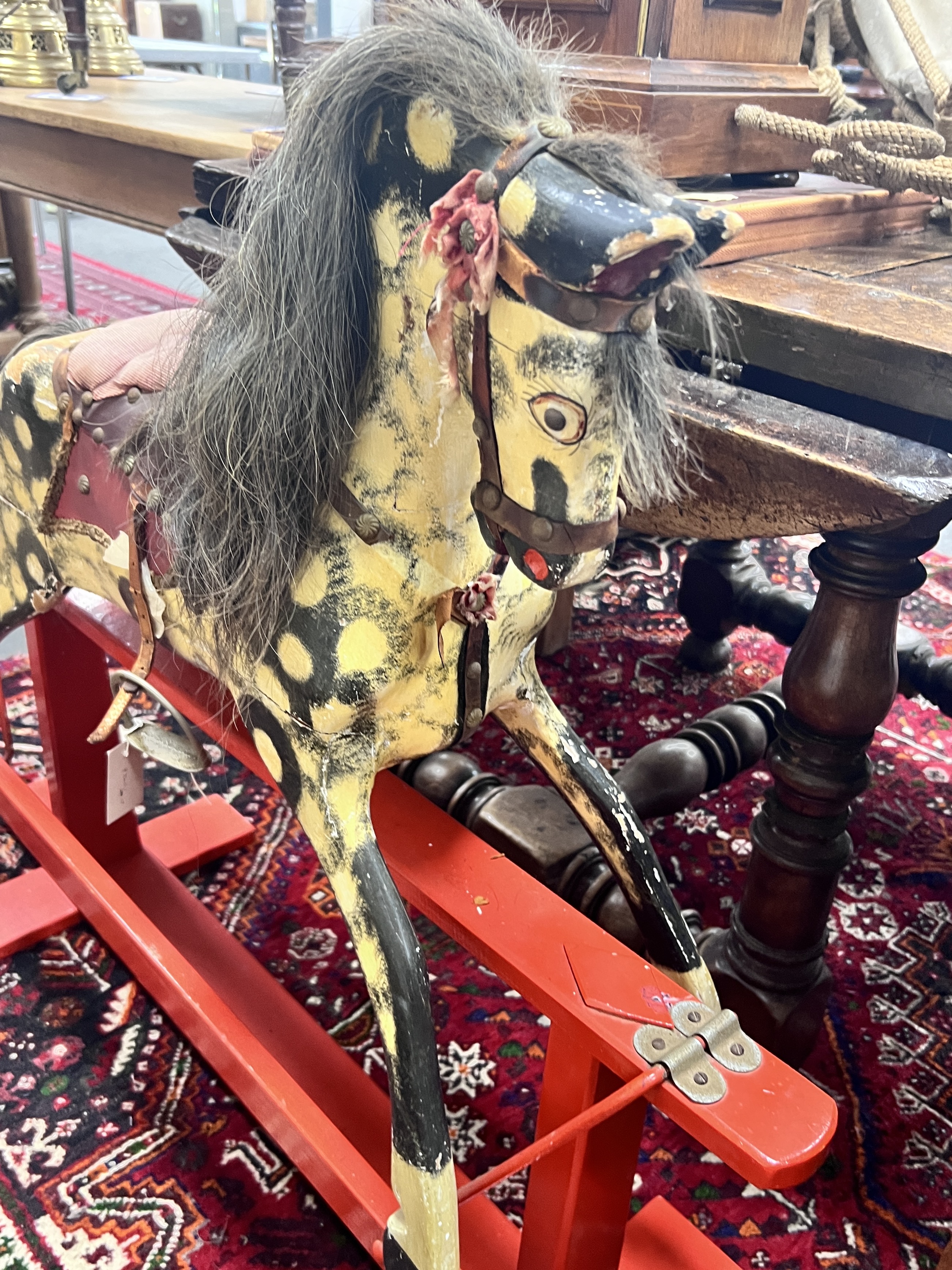 A rocking horse, width 108cm, height 90cm